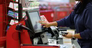 A-guest-completes-a-purchase-using-express-self-checkout-at-Target-728x381[1]