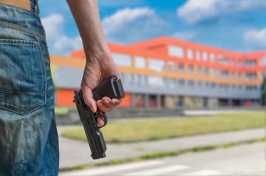 bigstock_Gun_Control_Concept_Young_Arm_148910870.58ae1ef9d207c[1]